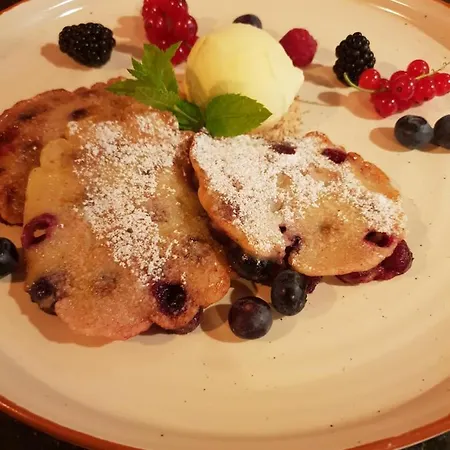 Отель Alpengasthof Gruener, In & Out